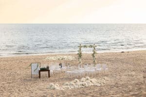 A well designed Ceremony area in Cabo San Lucas showcasing seats and wedding arch