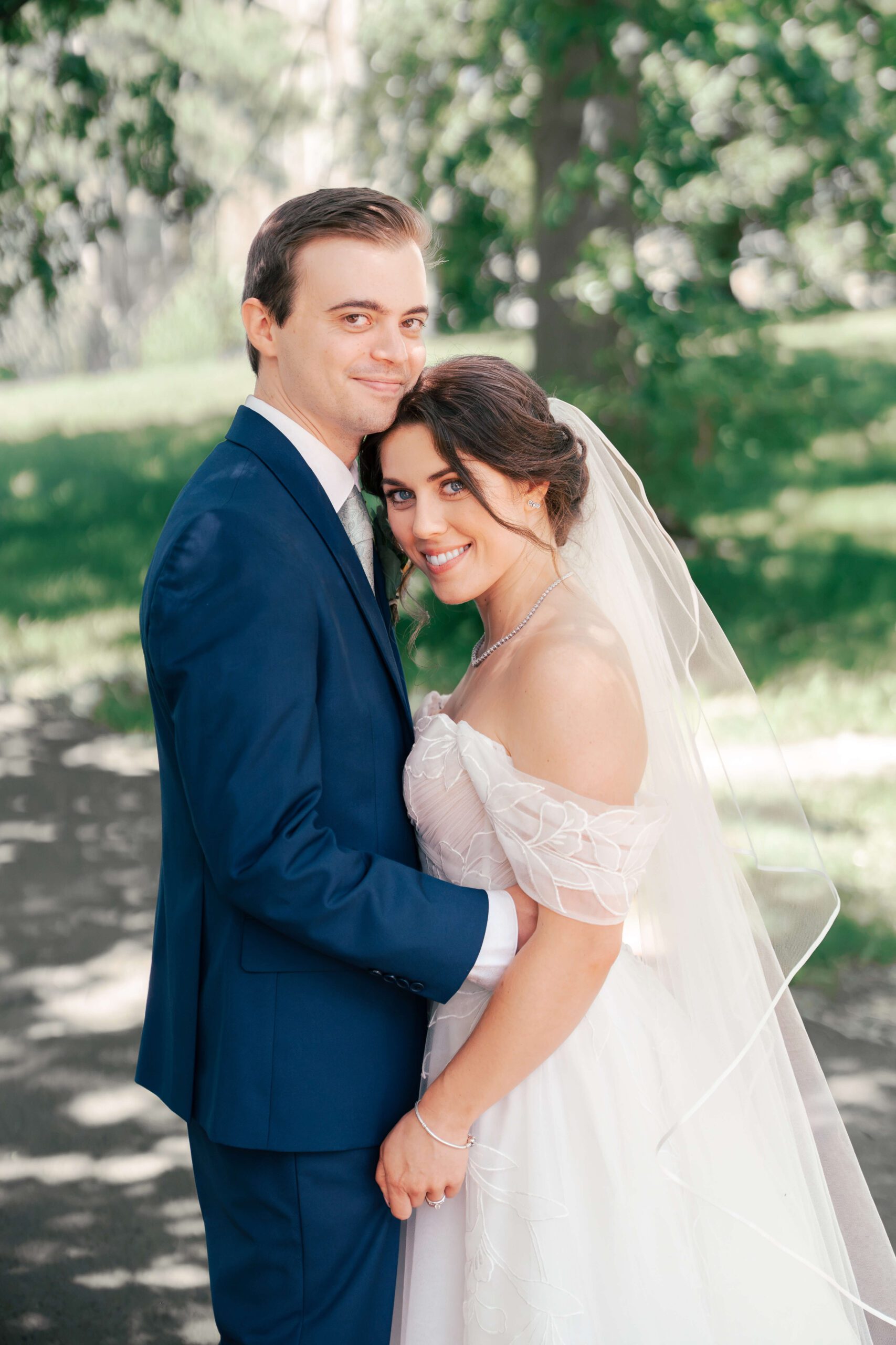 Couple lovingly embraces for the bridal photos in the Finger Lakes region